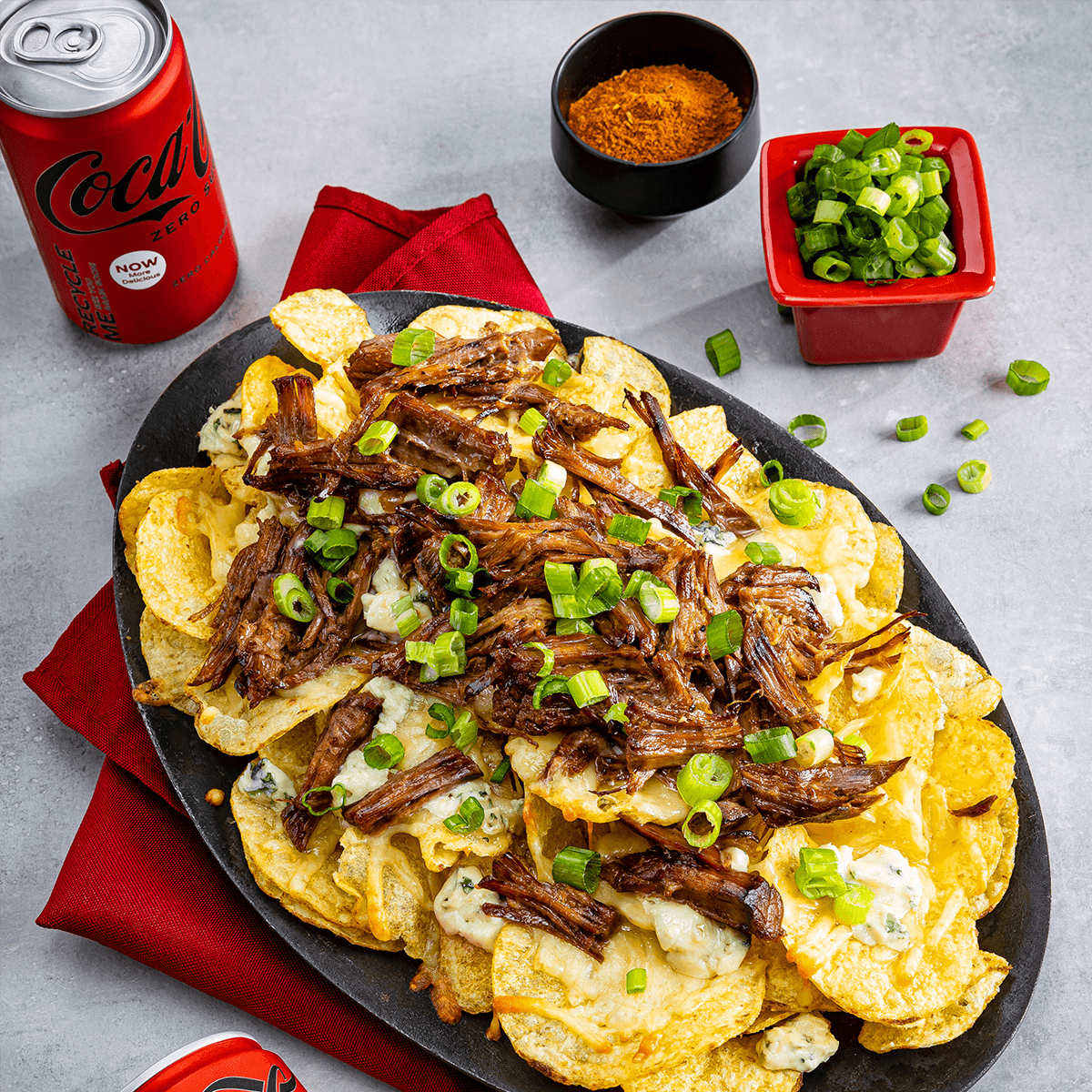 Slow Cooker Black &amp; Blue Beef Potato Chip Nachos - Coca-Cola® Recipe |  |