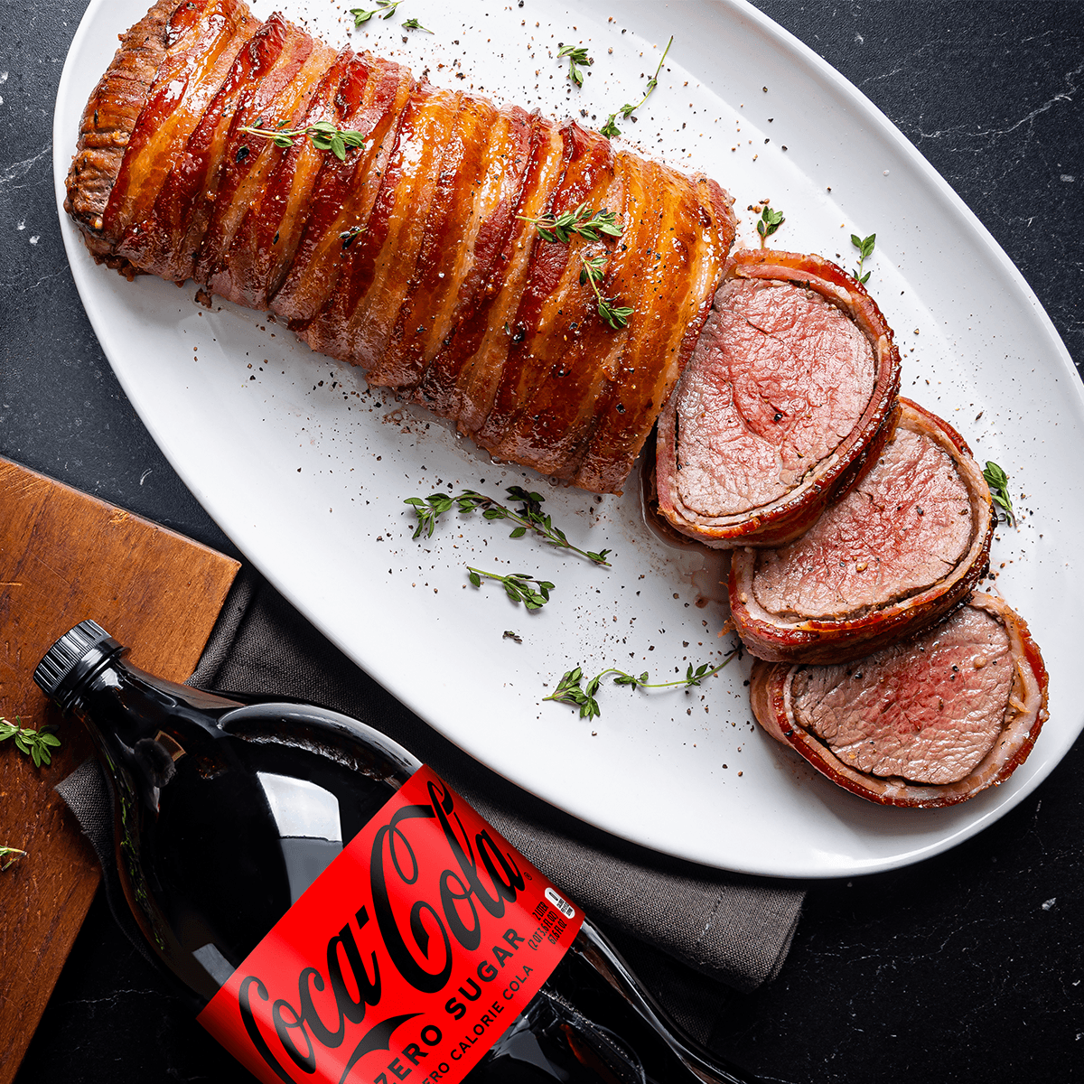 Bacon-Wrapped Garlic-Thyme Beef Tenderloin - Coca-Cola® Recipe |  |