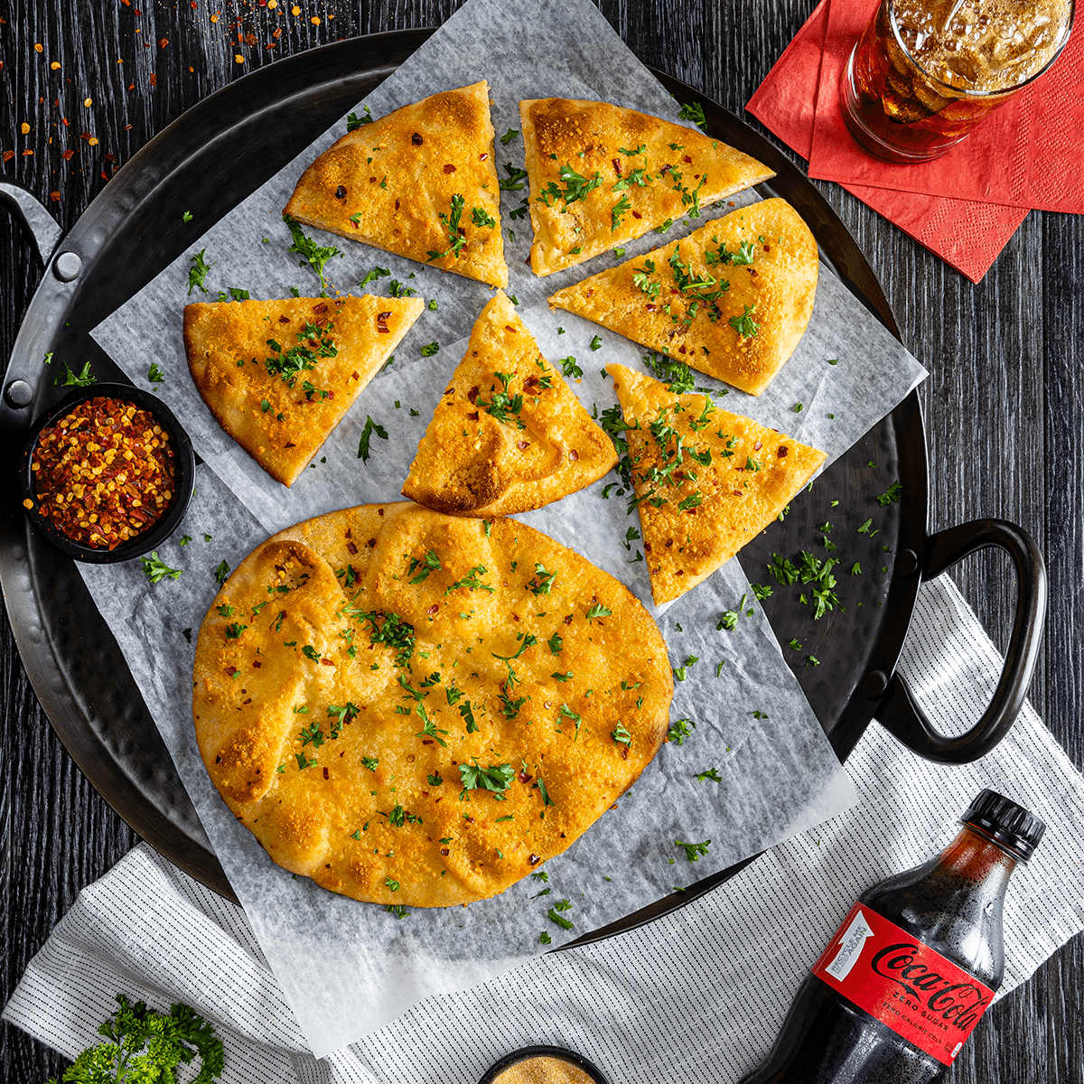 Garlic-Parm Flatbread - Coca-Cola® Recipe |  |
